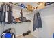 Spacious walk-in closet featuring ample storage on built-in shelving at 20858 E Progress Ave, Centennial, CO 80015