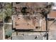 Aerial view of home with a large brown roof, stone patio, surrounded by mature trees and neighboring houses at 4267 Federal Blvd, Denver, CO 80211