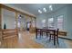 Open-concept living and dining areas with hardwood floors and abundant natural light at 4267 Federal Blvd, Denver, CO 80211