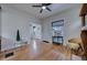 Bright living room features hardwood floors and decorative fireplace at 4267 Federal Blvd, Denver, CO 80211