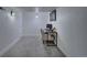 Bright office features neutral tones, carpet, modern desk, and a chair, creating a quiet space at 4267 Federal Blvd, Denver, CO 80211