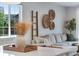 Cozy living room with a comfortable sofa, ladder, and natural decor elements at 944 Alpine Ridge St, Erie, CO 80516