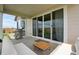 Covered patio with sliding glass doors, offering a seamless transition to indoor living spaces at 944 Alpine Ridge St, Erie, CO 80516