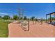 A wonderful community playground with slides, towers, and rope bridges, great for hours of outdoor fun at 944 Alpine Ridge St, Erie, CO 80516