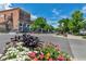 Charming street view with colorful flowers and historic buildings, perfect for enjoying a stroll at 944 Alpine Ridge St, Erie, CO 80516