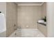 Modern bathroom with bathtub and tiled walls providing clean and luxurious appeal at 1700 Bassett St # 406, Denver, CO 80202