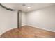 Bedroom with hardwood floors and modern minimalist design at 1700 Bassett St # 406, Denver, CO 80202