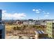 Enjoy panoramic city views from this property, showcasing a beautiful skyline and green spaces at 1700 Bassett St # 406, Denver, CO 80202