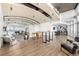 Large lounge area with tables, seating, and plenty of light at 1700 Bassett St # 406, Denver, CO 80202