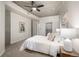 Spacious main bedroom featuring soft carpet, closet, and modern furnishings at 1700 Bassett St # 406, Denver, CO 80202