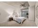 Bright main bedroom with floor-to-ceiling windows and plush carpet with modern furnishings at 1700 Bassett St # 406, Denver, CO 80202
