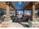 Beautiful wood pergola providing shade and architectural detail, with seating and community grill at 1700 Bassett St # 406, Denver, CO 80202