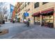 Vibrant street view featuring shops and outdoor dining areas at 1700 Bassett St # 406, Denver, CO 80202