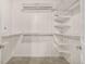 Walk-in closet with custom shelving and ample storage space at 1700 Bassett St # 406, Denver, CO 80202