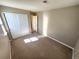 Carpeted bedroom offers natural light and a double door closet at 3747 Windriver Trl, Castle Rock, CO 80109