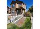 Inviting exterior featuring well-maintained landscaping, a cozy porch, and neutral-toned siding at 3747 Windriver Trl, Castle Rock, CO 80109