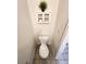 This half bath has a standard toilet and built in cabinet above at 3747 Windriver Trl, Castle Rock, CO 80109
