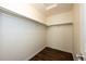 Walk-in closet features wooden floors, ample clothing rods and white walls at 5660 S Algonquian Way # C, Aurora, CO 80016