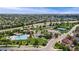 Aerial view of community pool, tennis courts, and recreation center at 6323 S Sicily Way, Aurora, CO 80016