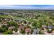 Aerial view of the home and Saddle Rock Golf Course at 6323 S Sicily Way, Aurora, CO 80016