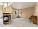 Comfortable living room with a modern fireplace and natural light at 6323 S Sicily Way, Aurora, CO 80016