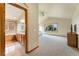 Spacious main bedroom with a high ceiling and attached bathroom at 6323 S Sicily Way, Aurora, CO 80016