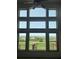 Large windows offering expansive views of the golf course and mountain range at 6323 S Sicily Way, Aurora, CO 80016