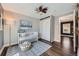 Calming bedroom features a crib, decorative accents, and ample closet space for a nurturing environment at 2942 Chase St, Wheat Ridge, CO 80214