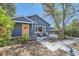 Charming single Gathering home with covered porch and beautiful walkway with mature landscaping at 2942 Chase St, Wheat Ridge, CO 80214