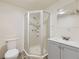 Bathroom with a glass shower, neutral decor, plus sink and vanity at 5749 S Lansing Way, Englewood, CO 80111