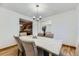 Dining area with hardwood floors and stylish seating at 5749 S Lansing Way, Englewood, CO 80111