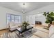 Inviting living room with hardwood floors and large windows at 5749 S Lansing Way, Englewood, CO 80111