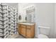 Bathroom with vanity, shower/tub combo, and stylish accents at 2502 S Bahama Cir # B, Aurora, CO 80013