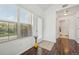 Bright entryway featuring wood floors, natural light, and a view into the home at 2502 S Bahama Cir # B, Aurora, CO 80013