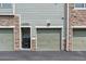 Garage doors with house number at 2502 S Bahama Cir # B, Aurora, CO 80013
