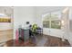 Cozy home office with wood floors, a view of other spaces and natural light at 2502 S Bahama Cir # B, Aurora, CO 80013