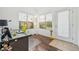 Inviting home office space with large windows, wood floors, and modern decor at 2502 S Bahama Cir # B, Aurora, CO 80013