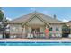 Poolside community space with chairs and a dining table at 2502 S Bahama Cir # B, Aurora, CO 80013
