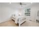 Cozy bedroom with light neutral carpet, large window and ceiling fan at 1274 Meyerwood Ln, Highlands Ranch, CO 80129