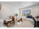 Cozy bedroom featuring a play teepee, desk, gaming system, and a window seat at 1274 Meyerwood Ln, Highlands Ranch, CO 80129