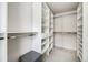 Large walk-in closet with custom shelving and storage at 1274 Meyerwood Ln, Highlands Ranch, CO 80129