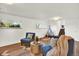Finished basement with a play area, comfortable seating, and natural light at 400 S Hoyt St, Lakewood, CO 80226