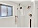 Bright bathroom showcasing glass-enclosed shower with bronze fixtures, subway tile, and natural light at 400 S Hoyt St, Lakewood, CO 80226