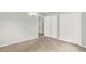 Spacious bedroom with large closets, plush carpeting, neutral walls, and natural light at 400 S Hoyt St, Lakewood, CO 80226