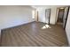 Spacious bedroom with hardwood floors and access to other rooms at 7101 W Yale Ave # 1206, Denver, CO 80227