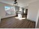 Bright dining area with hardwood floors and modern light fixture at 7101 W Yale Ave # 1206, Denver, CO 80227