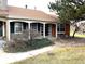 Brick ranch home with covered porch and landscaping at 7101 W Yale Ave # 1206, Denver, CO 80227