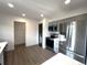 Modern kitchen with stainless steel appliances and gray cabinets at 7101 W Yale Ave # 1206, Denver, CO 80227