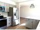 Updated kitchen featuring stainless steel appliances and an island at 7101 W Yale Ave # 1206, Denver, CO 80227