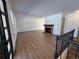 Living room features hardwood floors and a brick fireplace at 7101 W Yale Ave # 1206, Denver, CO 80227